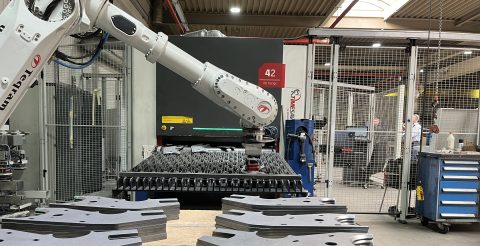 Robotic unloading of deburring machine